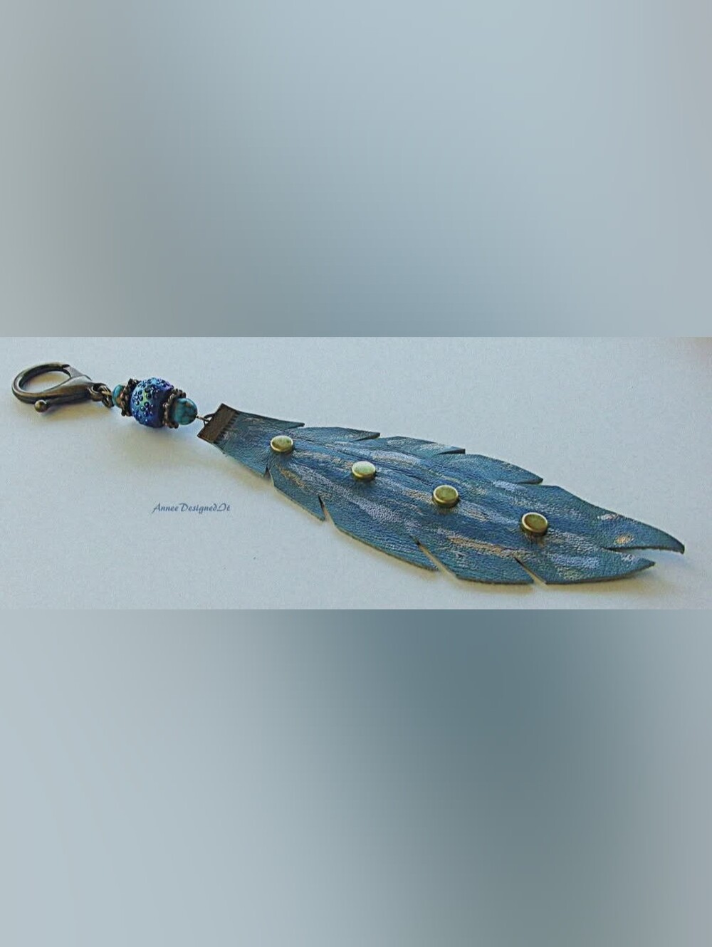 Blue Leather Feather Keychain with Bead Accent